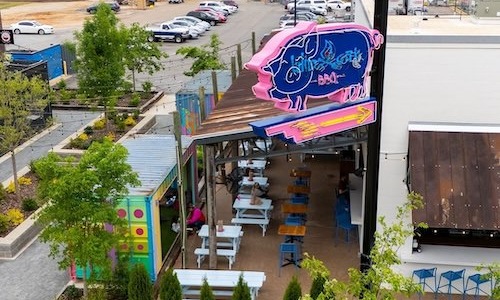 aerial view of a building with a sign