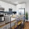 The Cassino: Chef-Inspired Kitchen with Stainless Steel Appliances and Ceramic Tile Backsplash